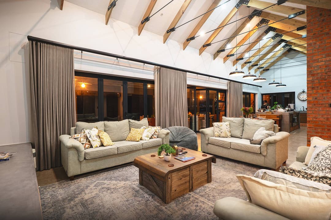 A spacious, well-lit lounge with a flatscreen TV and Netflix